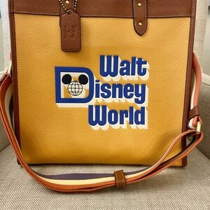 Coach Walt Disney World Large Leather Bag with Brass Accents and Suede Interior.